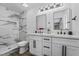 Modern bathroom with double vanity and marble shower at 4431 El Cebra Way, Las Vegas, NV 89121