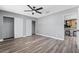 Bedroom with double closets and view into kitchen at 4431 El Cebra Way, Las Vegas, NV 89121