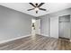 Bedroom with large closet and view into hallway at 4431 El Cebra Way, Las Vegas, NV 89121