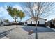 Modern house exterior with white and black accents and gravel landscaping at 4431 El Cebra Way, Las Vegas, NV 89121