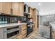 Newly renovated kitchen with stylish cabinets and modern range hood at 4431 El Cebra Way, Las Vegas, NV 89121