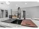 Kitchen island with modern sink and stylish gold faucet at 4431 El Cebra Way, Las Vegas, NV 89121