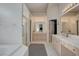 Elegant bathroom with double vanity and soaking tub at 4532 Laguna Vista St, Las Vegas, NV 89147