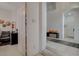 Elegant entryway with tile flooring, a bench and natural light at 4532 Laguna Vista St, Las Vegas, NV 89147