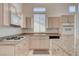 Granite countertops and updated cabinetry highlight this well-designed kitchen at 4532 Laguna Vista St, Las Vegas, NV 89147