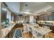 Kitchen featuring stone countertops, stainless steel appliances, and lots of cabinetry at 5170 Agio Ave, Pahrump, NV 89061