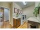 Bright laundry room with washer, dryer, and ample counter space at 5170 Agio Ave, Pahrump, NV 89061