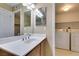 Bathroom with vanity, mirror, and in-unit laundry hookups at 5340 Silvermist Ct # 103, Las Vegas, NV 89122