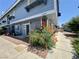 Well-maintained two-story building with lush landscaping and walkway at 5340 Silvermist Ct # 103, Las Vegas, NV 89122