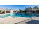 Community pool with surrounding patio and lounge chairs at 5340 Silvermist Ct # 103, Las Vegas, NV 89122