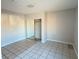 Bedroom with mirrored closet and tile flooring at 5453 Requa Ave, Las Vegas, NV 89110