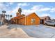 Orange house with a driveway and street view at 5453 Requa Ave, Las Vegas, NV 89110