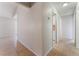 Hallway showcasing the light and neutral paint throughout at 5453 Requa Ave, Las Vegas, NV 89110