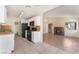 Charming kitchen with black appliances, tile floors and light cabinets at 5453 Requa Ave, Las Vegas, NV 89110