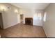 Bright living room featuring a fireplace and tile floors at 5453 Requa Ave, Las Vegas, NV 89110