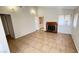 Living room with fireplace and tile floors at 5453 Requa Ave, Las Vegas, NV 89110