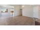 Bright living room with tile floors and view into kitchen at 5453 Requa Ave, Las Vegas, NV 89110