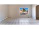 Living room with tile floors and street view at 5453 Requa Ave, Las Vegas, NV 89110