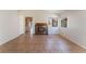 Bright living room featuring tile floors and fireplace at 5453 Requa Ave, Las Vegas, NV 89110