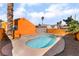 Backyard pool surrounded by desert landscaping, offering a private and enjoyable outdoor living space at 5453 Requa Ave, Las Vegas, NV 89110