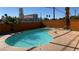 Relaxing kidney-shaped pool in sunny backyard at 5453 Requa Ave, Las Vegas, NV 89110