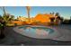 Home with a refreshing kidney-shaped pool at 5453 Requa Ave, Las Vegas, NV 89110