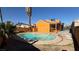 Home with a kidney-shaped pool in the backyard at 5453 Requa Ave, Las Vegas, NV 89110