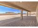 Covered patio with brick pavers and view of backyard at 5520 Acadia Leaf St, Las Vegas, NV 89149