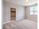 Bright bedroom with carpeted floor and private closet at 5520 Acadia Leaf St, Las Vegas, NV 89149