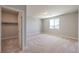 Well-lit bedroom with closet and neutral color scheme at 5520 Acadia Leaf St, Las Vegas, NV 89149