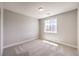 Cozy bedroom featuring neutral walls and carpeted floor at 5520 Acadia Leaf St, Las Vegas, NV 89149