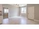 Light-filled dining area with tile floor and access to kitchen at 5520 Acadia Leaf St, Las Vegas, NV 89149