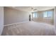 Open loft space with carpet and access to bathroom at 5520 Acadia Leaf St, Las Vegas, NV 89149