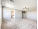 Spacious loft with window, carpet and ceiling fan at 5520 Acadia Leaf St, Las Vegas, NV 89149