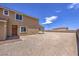 Side yard with gravel and partial home view at 5520 Acadia Leaf St, Las Vegas, NV 89149