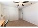 Well-lit bedroom with double doors leading to another room at 5824 Petrified Tree Ln, North Las Vegas, NV 89081