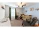 Bedroom with crib, rocking chair, and tree wall decal at 5824 Petrified Tree Ln, North Las Vegas, NV 89081