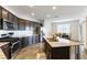 Modern kitchen with stainless steel appliances and granite countertops at 5824 Petrified Tree Ln, North Las Vegas, NV 89081