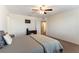 Main bedroom with carpeted floor and ceiling fan at 5824 Petrified Tree Ln, North Las Vegas, NV 89081