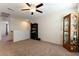 Upstairs loft area with ceiling fan and bookcase at 5824 Petrified Tree Ln, North Las Vegas, NV 89081