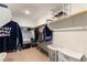 Spacious walk-in closet with ample shelving and hanging space at 5824 Petrified Tree Ln, North Las Vegas, NV 89081