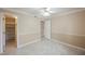 Bright bedroom with tile floors, neutral walls, and ample closet space at 601 Cabrillo Cir # 323, Henderson, NV 89015