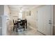 Dining area with table and chairs near entry and kitchen at 601 Cabrillo Cir # 323, Henderson, NV 89015