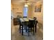 Dining area with four chairs and tile floors at 601 Cabrillo Cir # 323, Henderson, NV 89015