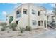 Two-story building with multiple balconies and landscaping at 601 Cabrillo Cir # 323, Henderson, NV 89015