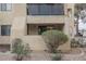 Exterior view of condo building with private patio and landscaping at 601 Cabrillo Cir # 323, Henderson, NV 89015