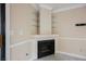 Corner fireplace with glass shelves in living room at 601 Cabrillo Cir # 323, Henderson, NV 89015