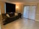 Bright living room featuring tile floors and sliding glass doors at 601 Cabrillo Cir # 323, Henderson, NV 89015