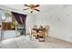 Dining area with round table and sliding door at 6133 Meadowgrass Ln, Las Vegas, NV 89103