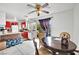 Kitchen with red cabinets and breakfast bar at 6133 Meadowgrass Ln, Las Vegas, NV 89103